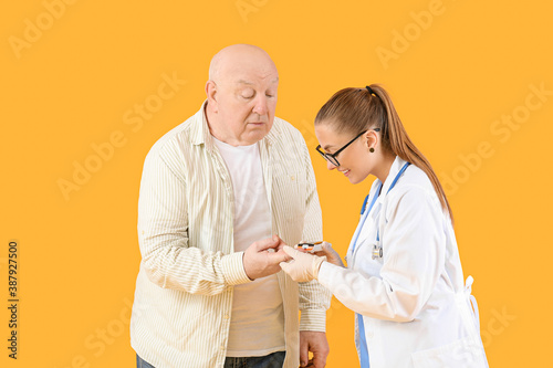 Doctor checking blood sugar...