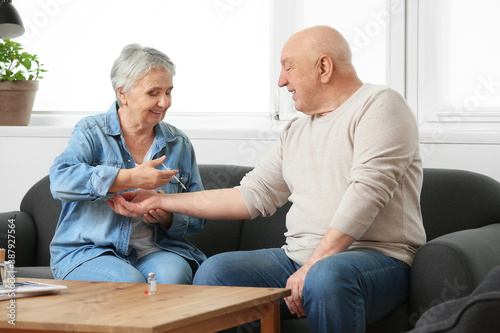 Senior diabetic couple at home