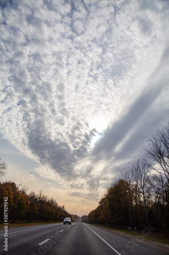 beautiful clouds before sunset on the highway