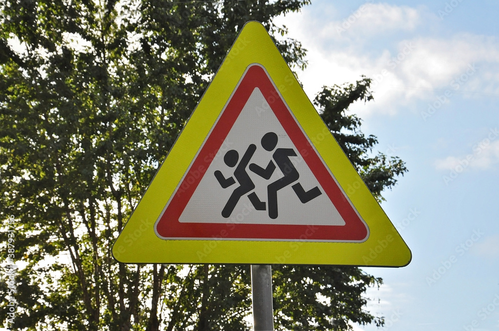road sign warning caution children