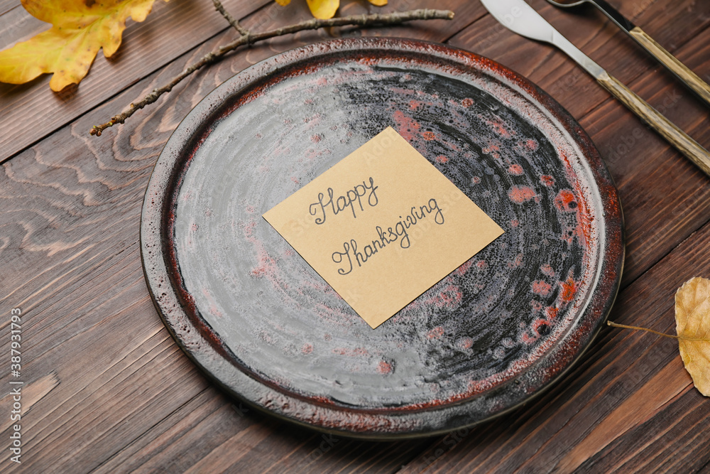 Beautiful table setting for Thanksgiving Day celebration on wooden background Beautiful table setting for Thanksgiving Day celebration on wooden background