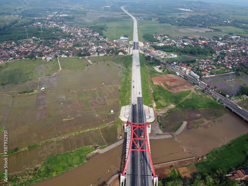 Aerial view of the splendor of Kali Kutho Bridge, Kali Kuto, Trans Java Highway, Indonesia photo