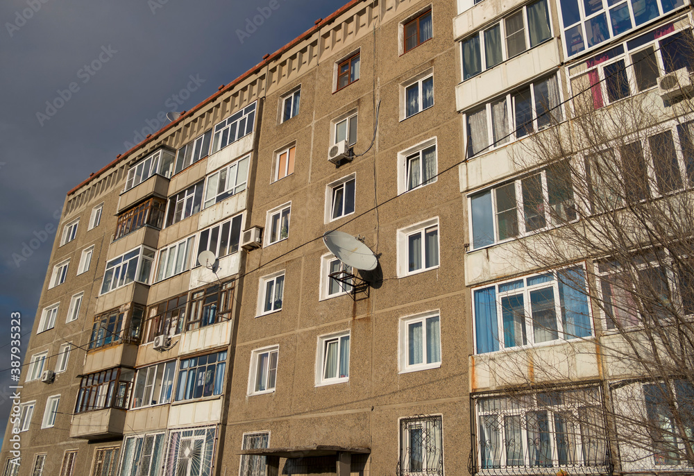 Soviet apartment building. Apartment block. Soviet architecture. Ust-Kamenogorsk (Kazakhstan). Concrete apartment building. Plattenbau