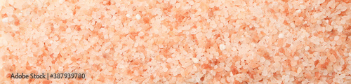Pink himalayan salt on white background, top view