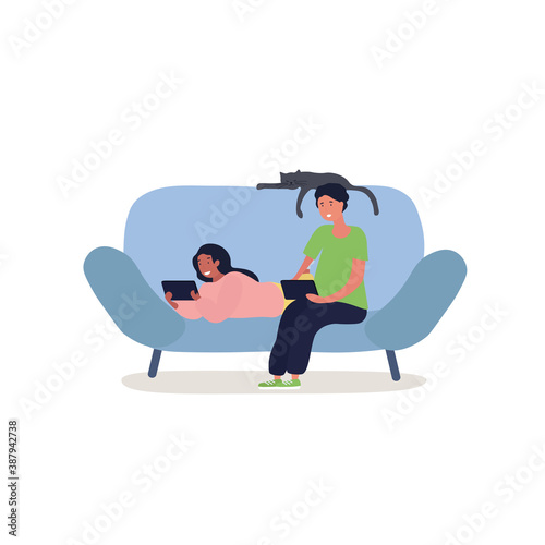Diverse multiracial kids, boy and a girl are sitting on the couch and playing games on a tablet. Flat cartoon vector illustration with fictional character isolated on white
