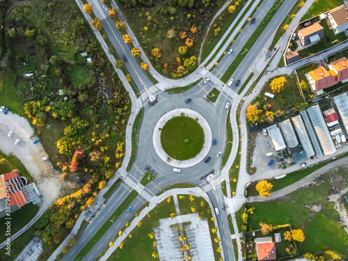 autumn roundabout with traffic top aerial drone view