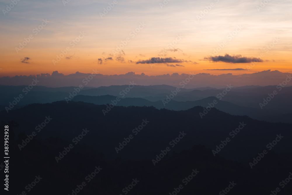 Sunset and mountains in the evening in the forest