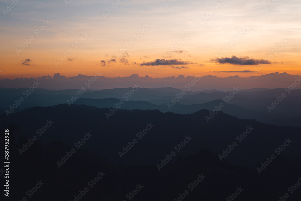 Sunset and mountains in the evening in the forest Sunset and mountains in the evening in the forest