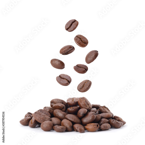 Flying whirl roasted coffee beans in the air studio shot isolated on white background, Healthy products by organic natural ingredients concept
