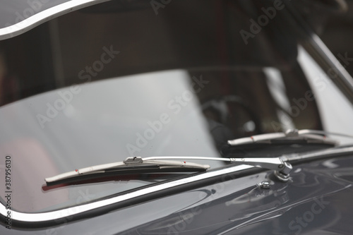 Glass windshield and windshield wiper of a classic car