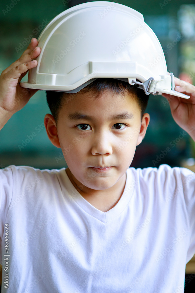 portrait of asian children and white safety helmet portrait of asian children and white safety helmet