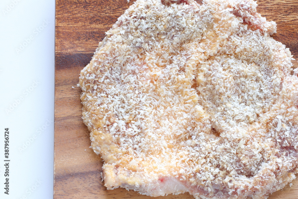 Fototapeta premium breadcrumbs and pork for Milano cutlet prepared for cooking