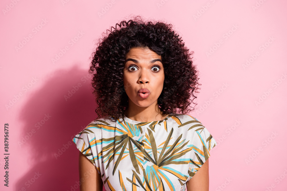 Photo portrait of shocked woman isolated on pastel pink colored background Photo portrait of shocked woman isolated on pastel pink colored background