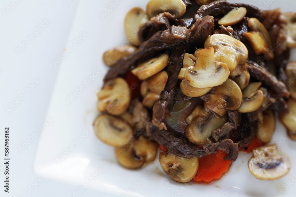 Chinese food, beef and mushroom stir fried for comfort food Chinese food, beef and mushroom stir fried for comfort food