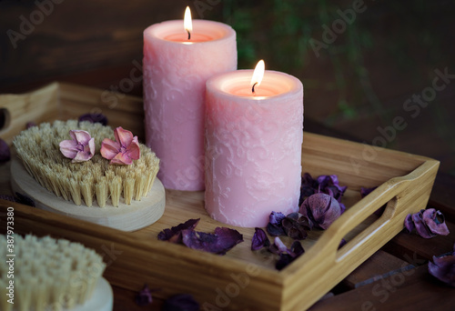 Dry massage brushes and candles. Cosmetic treatment for beauty. Natural aromatherapy. Healthy bath, body care, health care, wellness. Nature for body