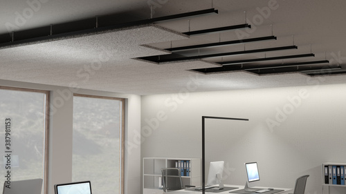 Acoustic noise reduction panels made of wood wool fibres mounted at the ceiling of an office for acoustic insulation 2 close view of the mounted ceiling