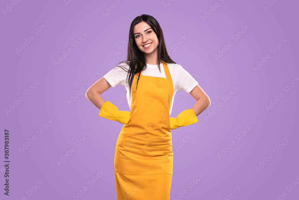Positive chambermaid smiling for camera Positive chambermaid smiling for camera