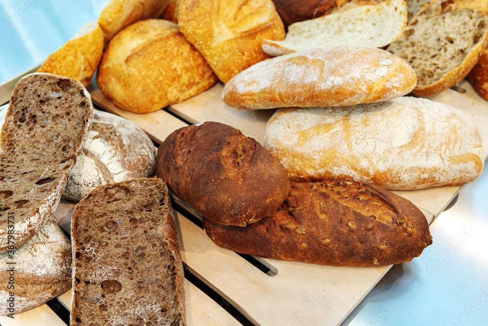 Different types of bread on the counter in a private bakery. Small business in the grocery sphere