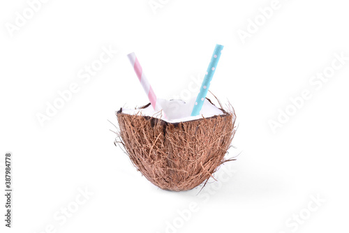 Coconut coctail drinking straw for two on white background