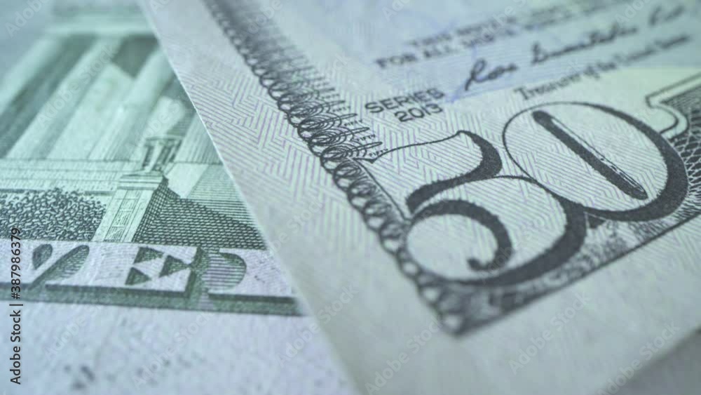 many-bills-of-usd-on-the-table-50-american-dollars-in-macro-shot-with