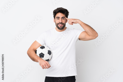 Young handsome man with beard over isolated white background intending to realizes the solution