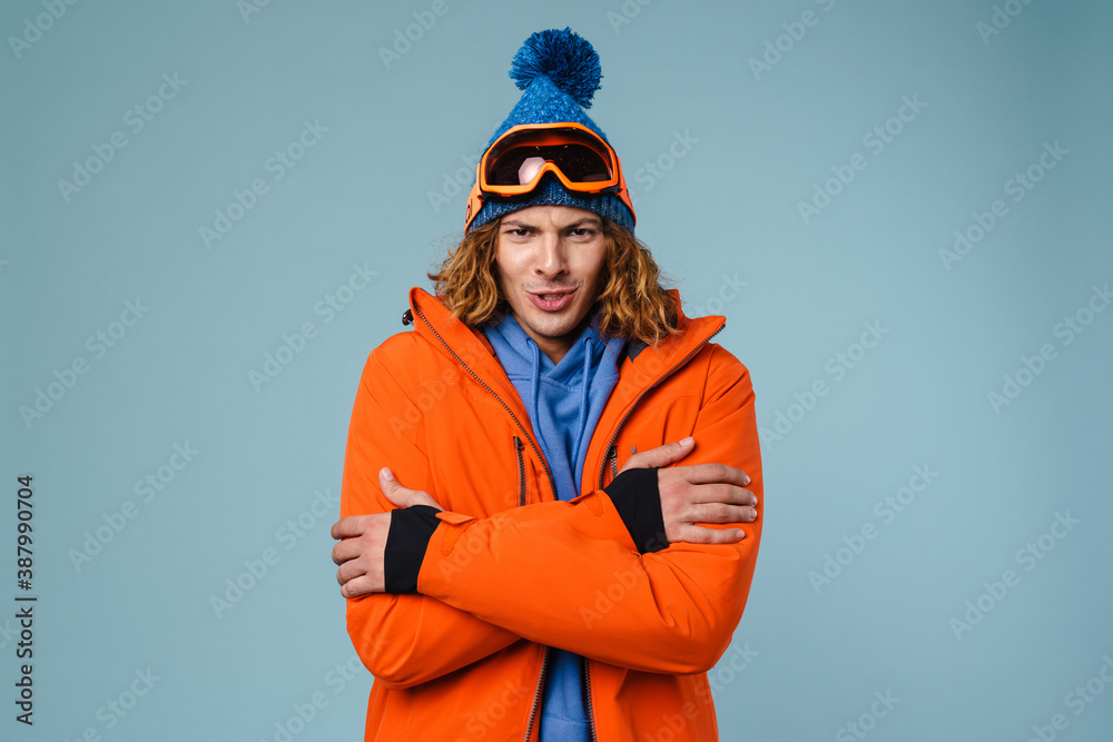 Caucasian displeased sportsman posing with palms together Caucasian displeased sportsman posing with palms together