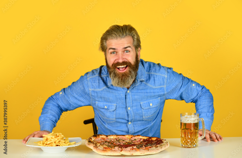 Beer and food. Could not be better. Dinner at pub. Hungry man going to eat pizza and drink beer. Finally pizza time. Pizzeria restaurant. Cheerful man bearded hipster eat pizza. Pizza party concept Beer and food. Could not be better. Dinner at pub. Hungry man going to eat pizza and drink beer. Finally pizza time. Pizzeria restaurant. Cheerful man bearded hipster eat pizza. Pizza party concept