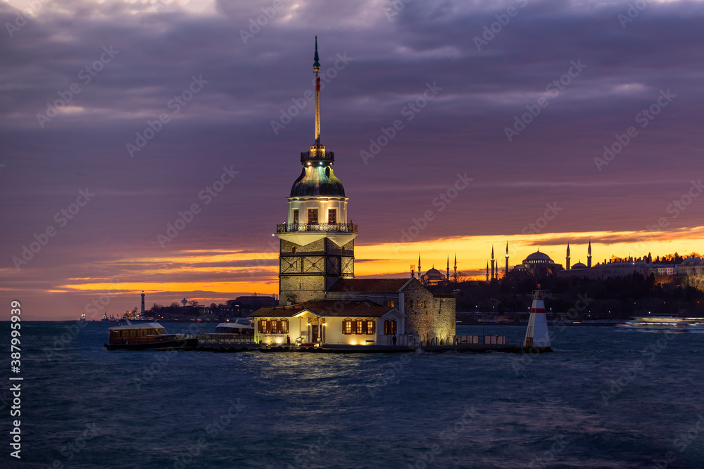 Maiden tower (Kiz kulesi), on a small island in the Bosphorus. Night landscape of Istanbul, Turkey.
