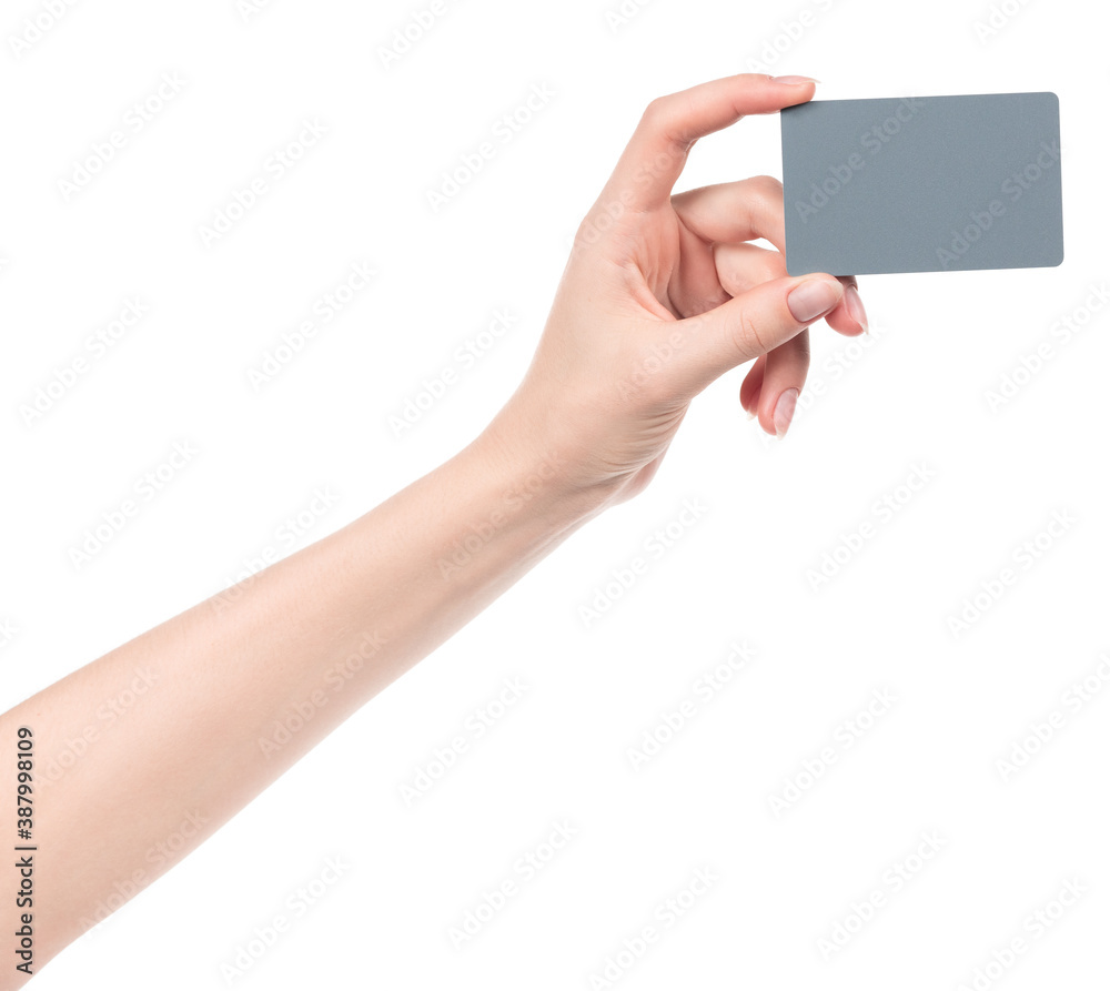 Obraz premium Female caucasian hands with blank business card isolated on white background. blank for designers