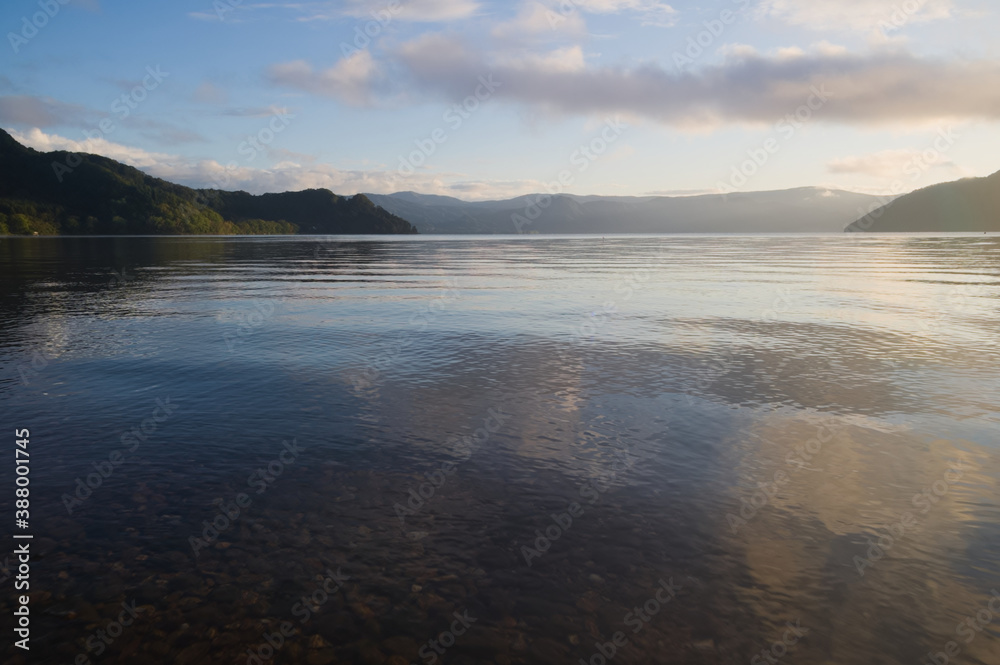 Fototapeta premium sunset over the lake