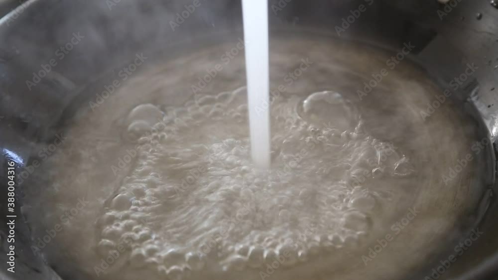 Boiling water in a kitchen pot Boiling water in a kitchen pot