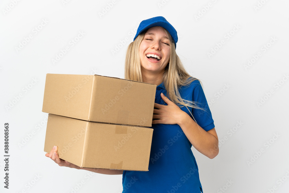 ¬°Young delivery woman isolated on white background smiling a lot ¬°Young delivery woman isolated on white background smiling a lot