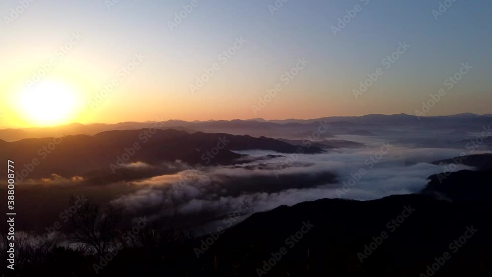 Time-lapse of sunrise over the mountains Time-lapse of sunrise over the mountains