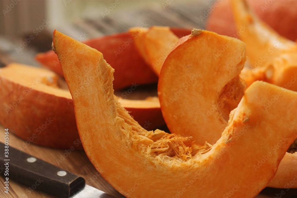 Fresh ripe pumpkin on a wooden table Fresh ripe pumpkin on a wooden table