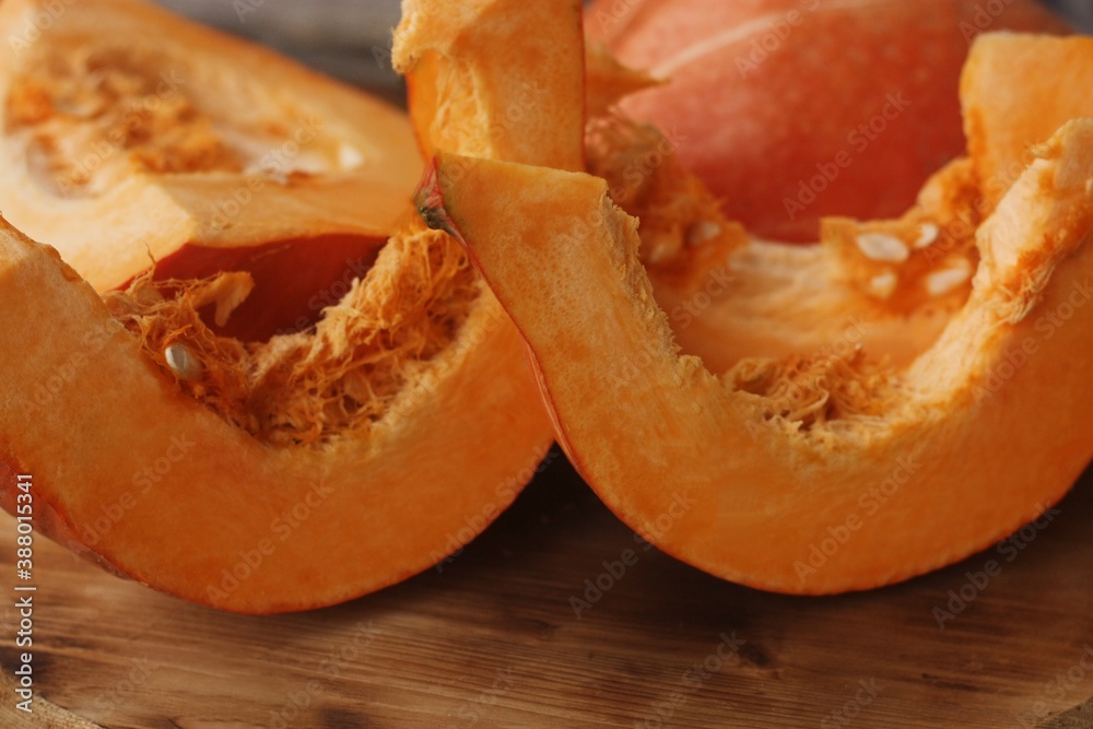 Fresh ripe pumpkin on a wooden table Fresh ripe pumpkin on a wooden table
