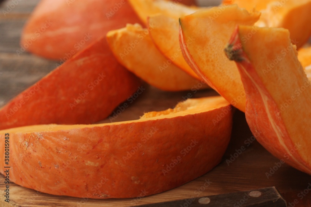 Fresh ripe pumpkin on a wooden table Fresh ripe pumpkin on a wooden table