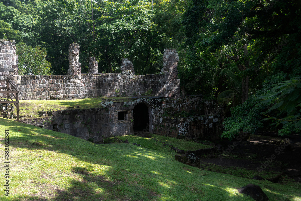 The ruins of the Wingfield Estate Sugar Plantation in St. Kitts in the Caribbean lie abandoned at the edge of the woods. The ruins of the Wingfield Estate Sugar Plantation in St. Kitts in the Caribbean lie abandoned at the edge of the woods.