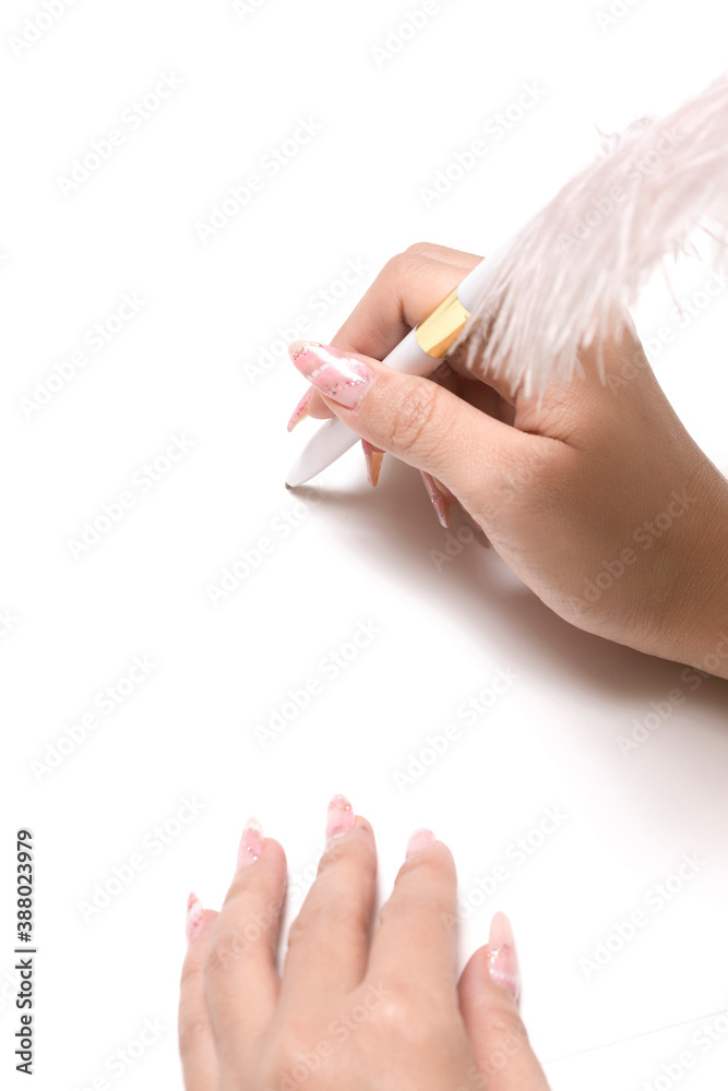 Fototapeta premium 羽根ペンを持つ女性