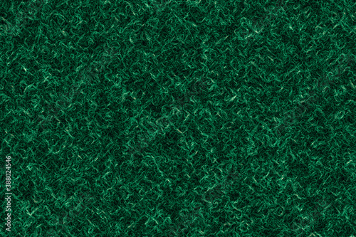 Cristmas abstract background in dark green, tangled threads, chaotic Smoky glowing waves in the dark, fantastic motives and fantasy. Screen saver for computer or smartphone. Blank for designe