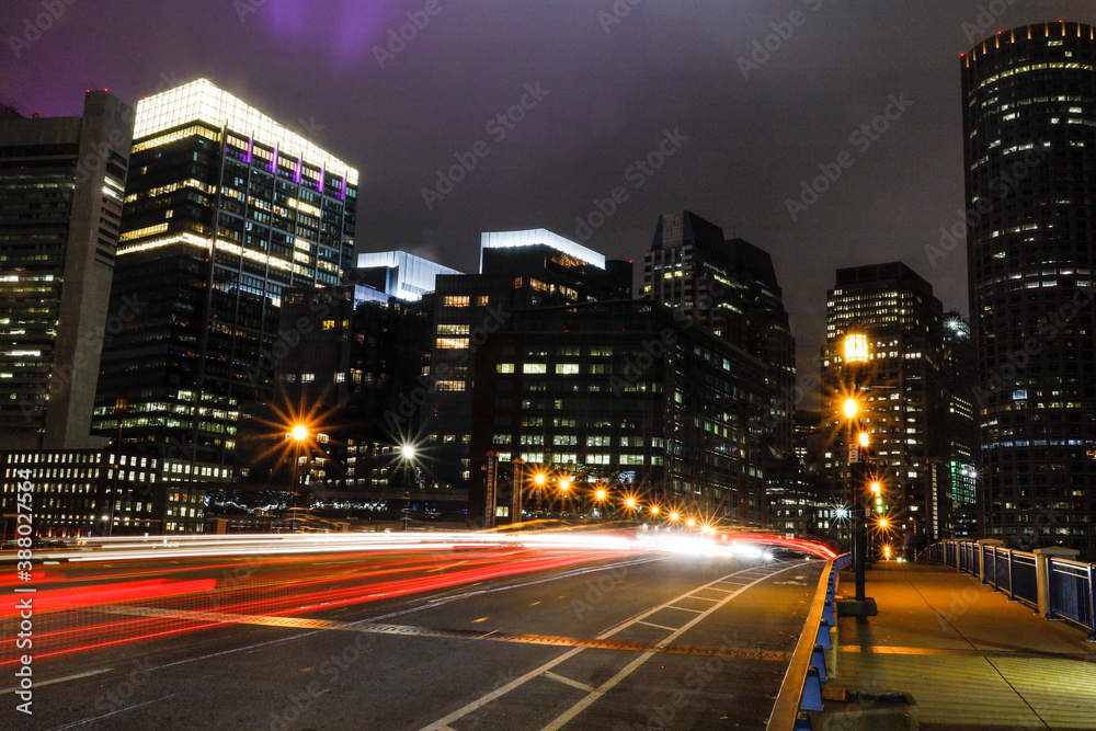 Boston, Massachusetts, USA Traffic and light trails on The Seaport Boulevard bridge.