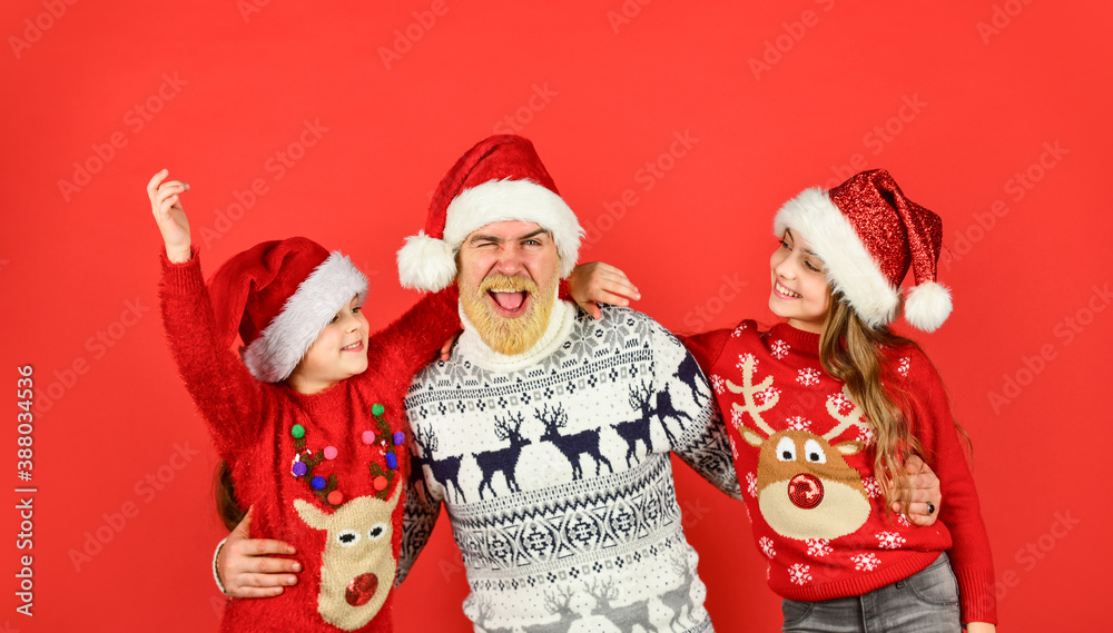 Christmas becomes special with children. Christmas eve concept. Winter holidays. Family time. Father and little daughters celebrate new year together. Holly jolly christmas. Dad and kids having fun