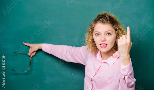 explanation. back to school. empty blackboard. girl teacher at school lesson. student glasses at blackboard. Formal informal and nonformal education. new school year. Girl prepare for exams photo