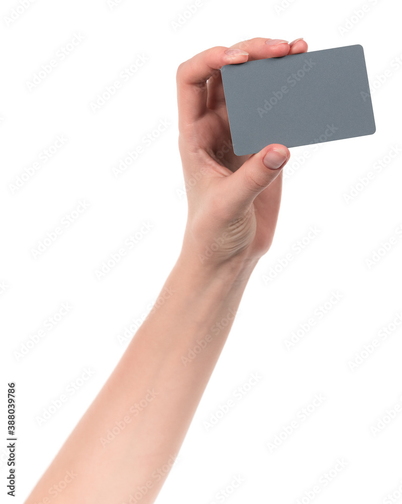 Female caucasian hands with blank business card isolated on white background. blank for designers