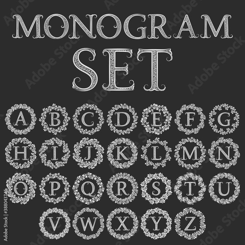 Set of monograms in circular floral wreath. Vintage latin alphabet in round floral frames. Isolated letters labels in vintage baroque style.