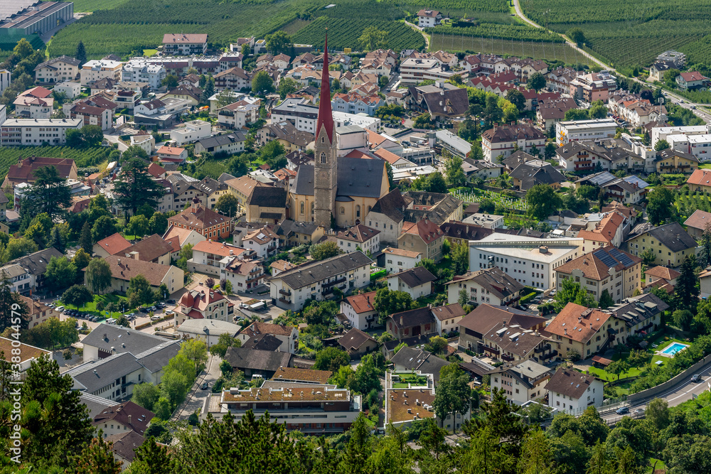 Superb aerial view of the old town of Silandro, South Tyrol, Italy, on a sunny day