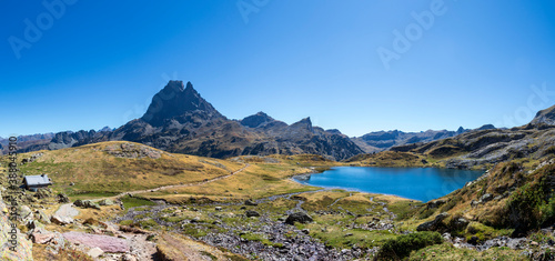 Pic du Midi d'Ossau mountain and Lac Gentau mountain lake in Ossau Valley, iconic symbol of the French Pyrenees, Pyrenees National Park