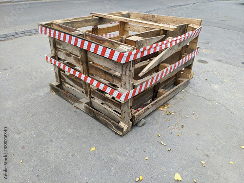wooden fence for an open sewer well