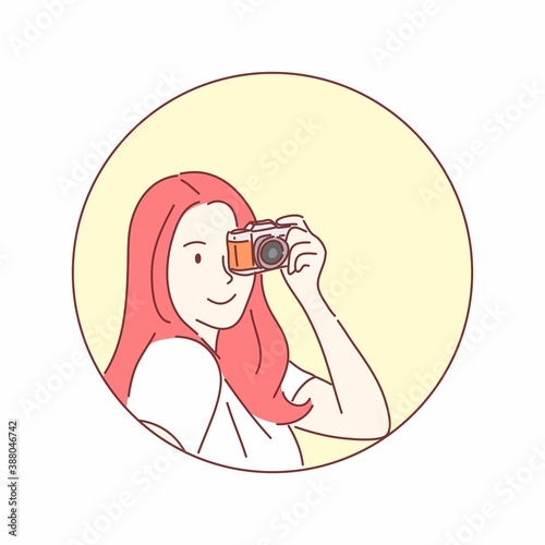 Woman holding camera. Hand drawn flat character vector style.