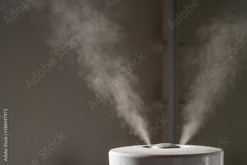 Close-up of steam from an air humidifier in a living room