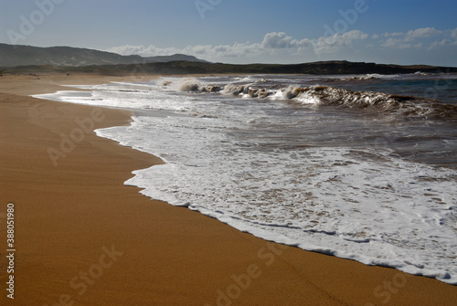 Waves on remote three mile Moomomi Beach Molokai photo